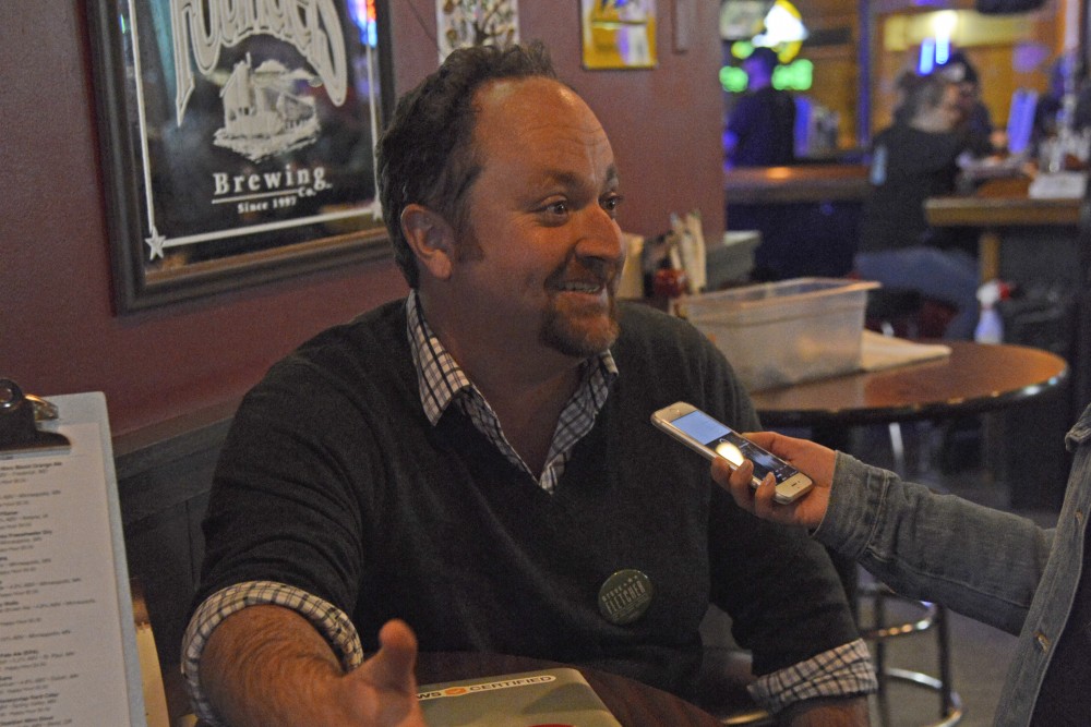 Steve Fletcher speaks with the Minnesota Daily during his Election Day party at Macs Industrial Sports Bar on Nov. 7.