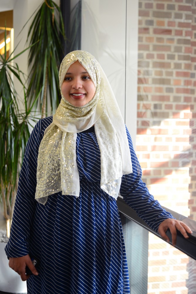 Imane Ait Daoud, a senior Physiology and Psychology major, poses for a photo in Coffman Memorial Union on Tuesday, October 31. Daoud recently received a grant to conduct an interfaith justice project at the University of Minnesota.