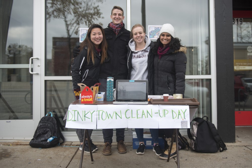 From left, Kathryn Doan, Joseph Scholl, Kelley Bunge and Soniya Somani, organizers of the Dinkyown Clean-up day, pose in front Tim Hortons on Sunday, Nov. 5.