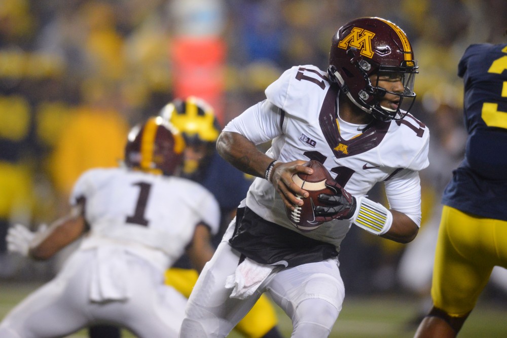 Quarterback Demry Croft looks for a teammate to pass to on Saturday, Nov. 4, in Ann Arbor, Michigan. The Gophers lost to the Wolverines 33-10.