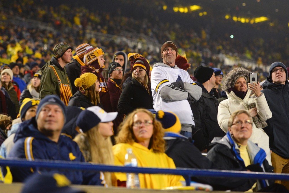 Gopher fans stand in a sea of Wolverine fans during the oldest rivalry game in the Big Ten Conference on Saturday, Nov. 4, 2017 in Ann Arbor, Mich. The Gophers lost to the Wolverines 33-10. 