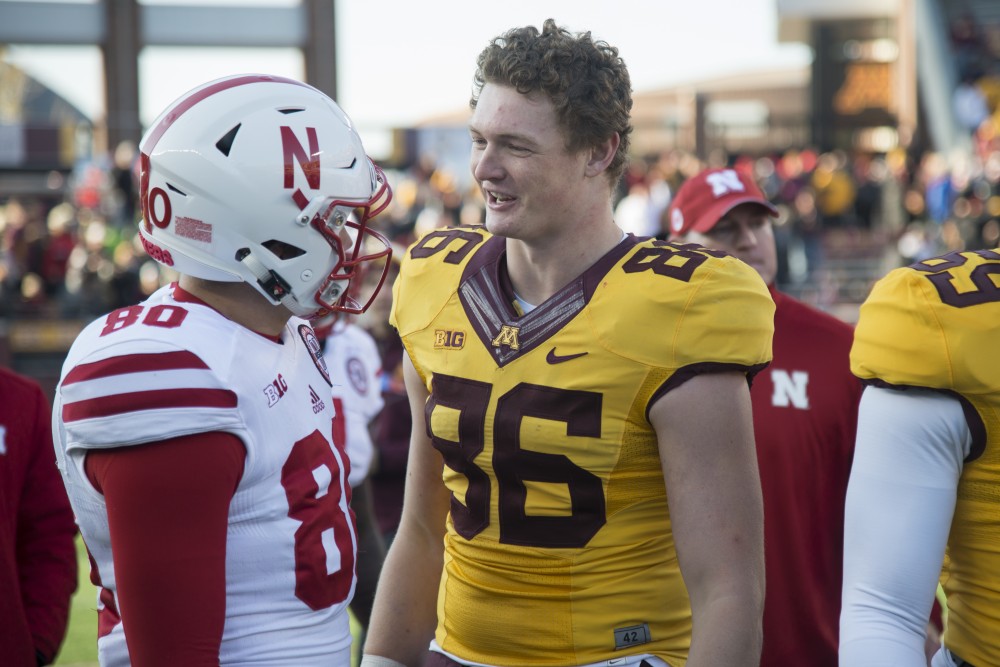 Tight end Brandon Lingen exchanges words with a Nebraska player at TCF Bank Stadium on Saturday, Nov. 11.