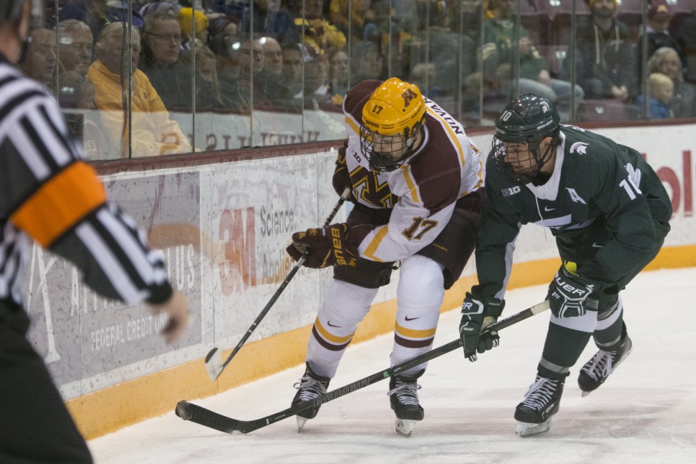 Forward Tommy Novak goes after the puck during the Gophers game against Michigan State at 3M Arena at Mariucci on Friday, Nov. 3.