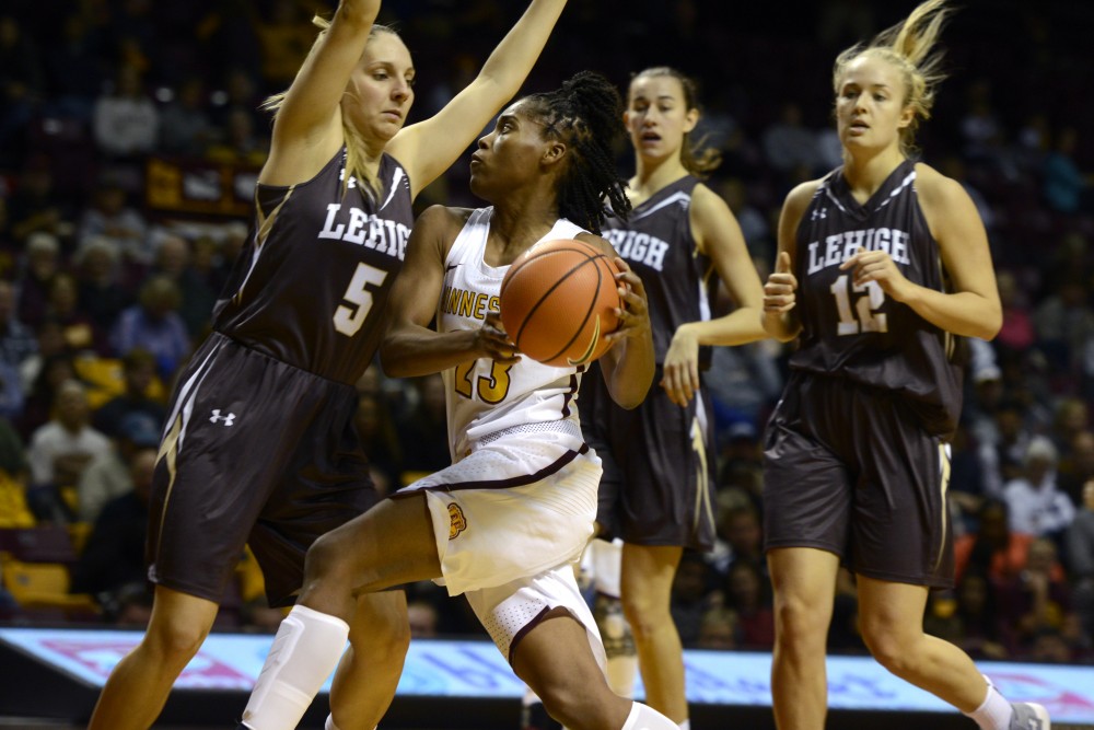 Guard Kenisha Bell prepares to shoot the ball in a game against Lehigh University at Williams Arena on Saturday, Nov. 11. 