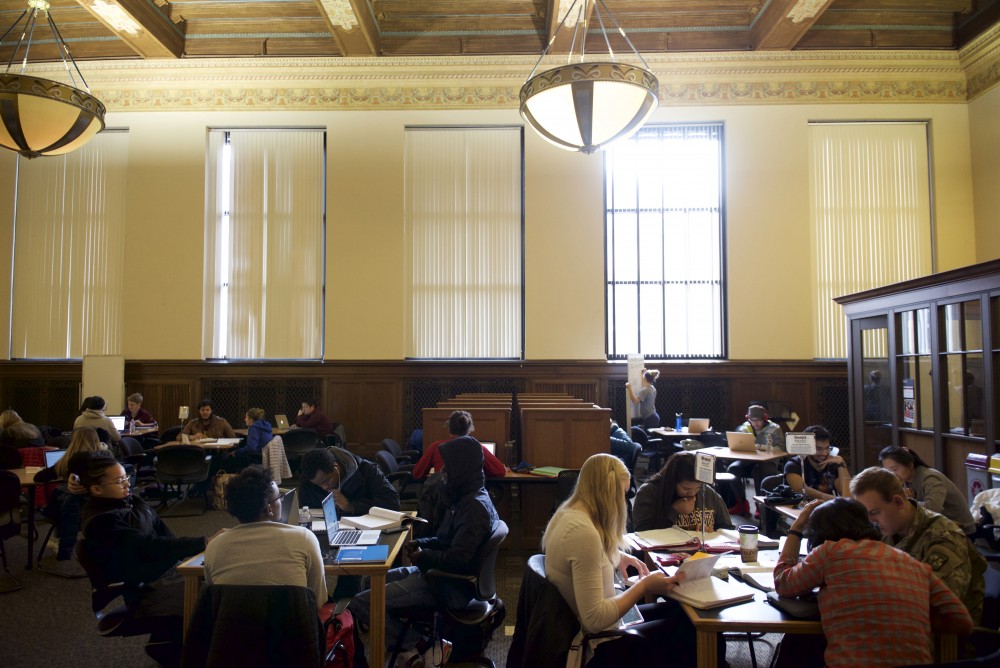 Students and tutors fill tables at the SMART learning commons in Walter Library on Monday, Nov. 13.