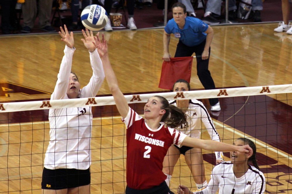 Middle Blocker Regan Pittman hits the ball at the volleyball game against the UW-Madison Badgers at the Maturi Pavilion on Oct 21, 2017.  The Gophers beat the Badgers on Sunday for the first time since 2018. 