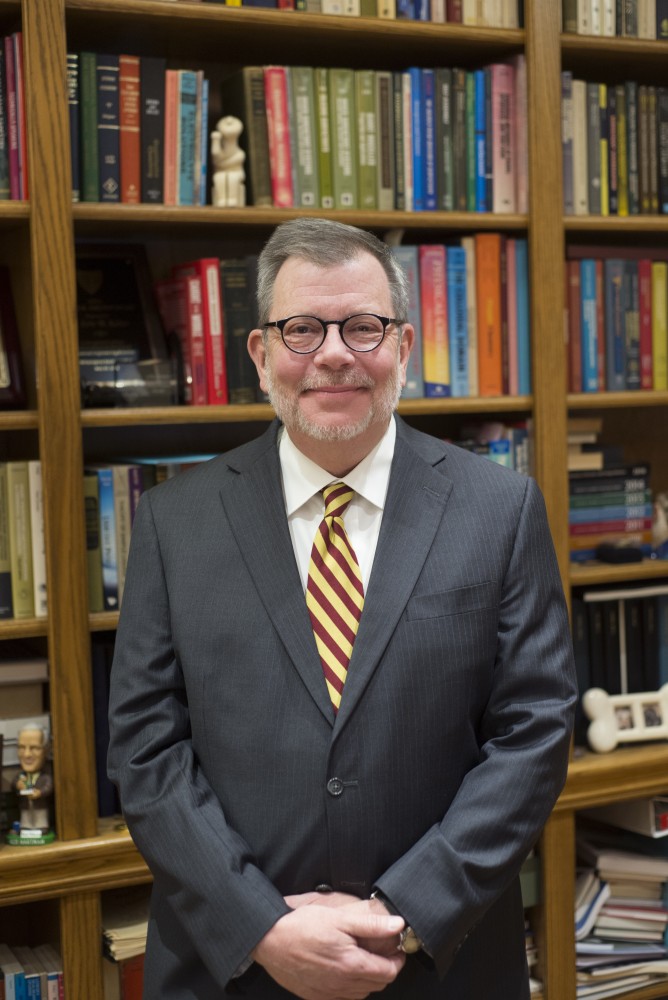 University President Eric Kaler poses for a portrait in his office before a interview with Minnesota Daily on Thursday, Nov. 16.