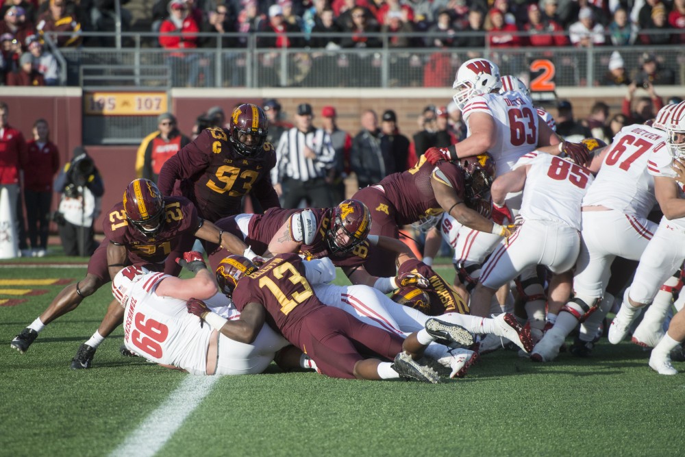 The Gophers defense holds the goal line after the Badgers attempt to score a touchdown at TCF Bank Stadium on Saturday, Nov. 25. The Badgers defeated the Gophers 31-0.