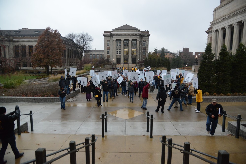Teamsters Local 320, a union group for public employees, hosted a march on the University of Minnesota campus on Friday, Nov. 17, 2017 outside Morrill Hall in Minneapolis, Minn. The group is joining with other faculty and student organizations who are pushing for fair wages at the University.