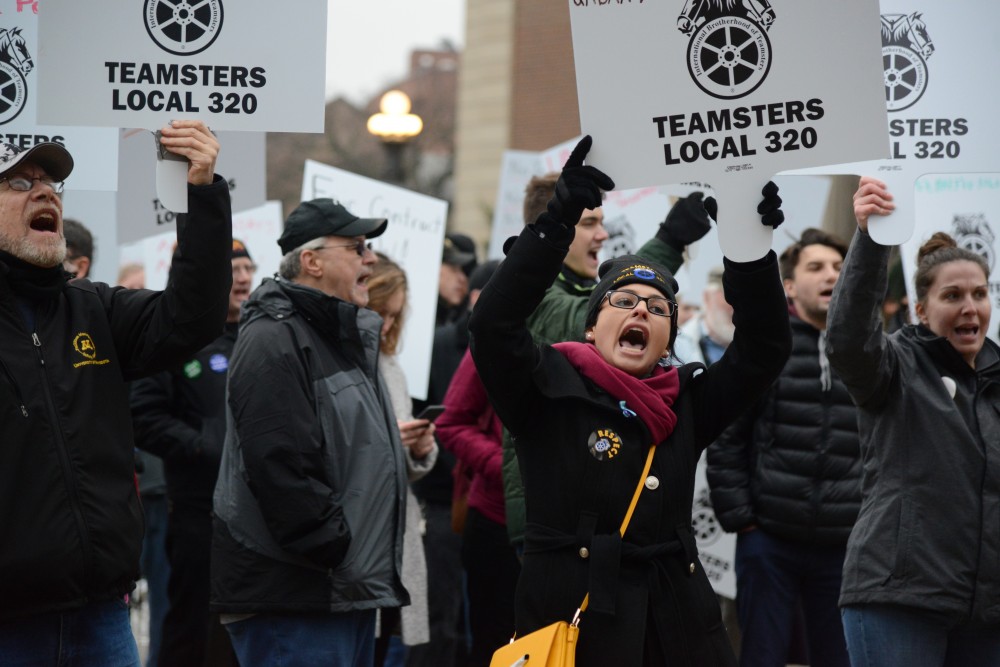 Hannah Bernardson, a business agent for the union group Teamsters Local 320, protests on Friday, Nov. 17, outside Morrill Hall in Minneapolis. The group is fighting for fair wages at the University of Minnesota.