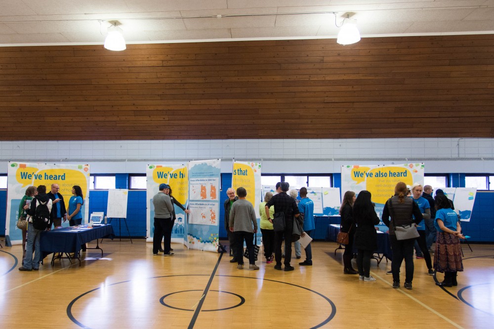 City Planners and members of the public mingle during a Minneapolis 2040 community outreach event in Como on Saturday, Dec. 2. The event is the first of a four-part series which seeks public input on issues such as transportation and housing.