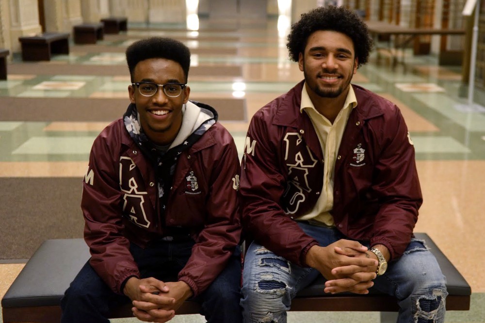 Newly-elected National Panhellenic Council Chairman Samson Ghirmai, left, and Vice Chair Seth Green, right, pose for a photo on Thursday Nov. 30 in Northrop Auditorium. Both Ghirmai and Green are sophomores and members of Kappa Alphi Psi.