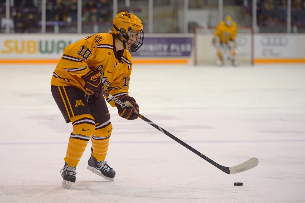 Forward Cara Piazza looks to pass the puck at the Ridder Arena on Saturday, Nov. 18.