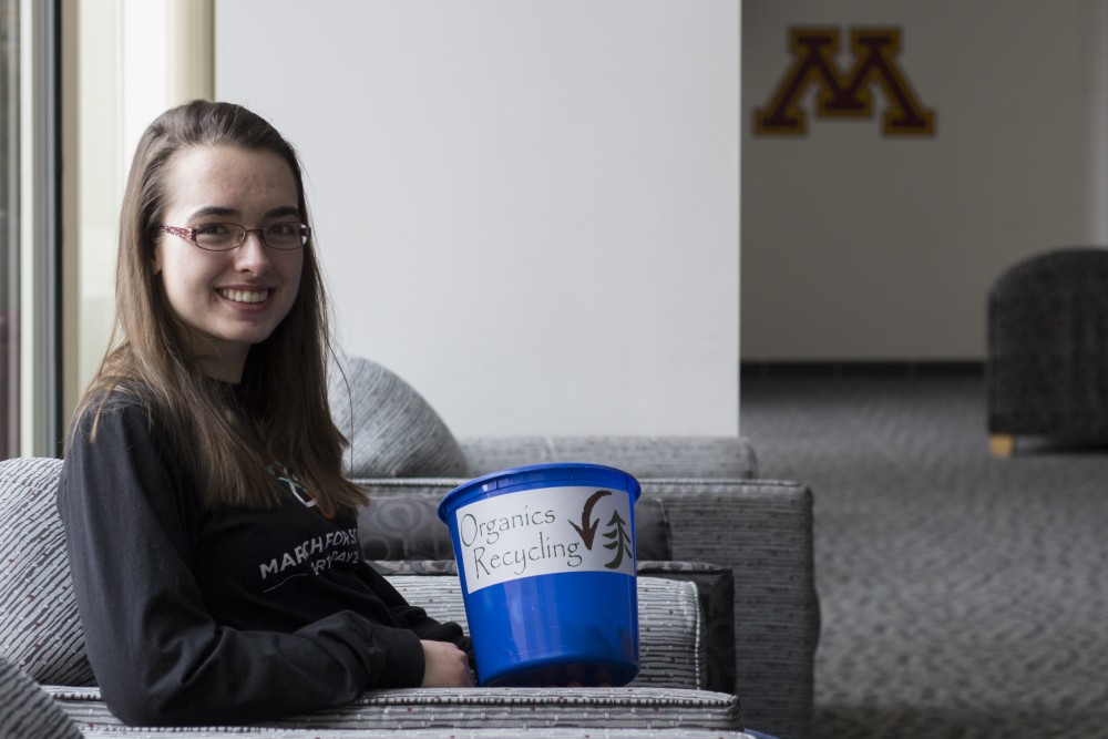 Environmental sciences, policy and management junior, Claudia Althoen, poses for portraits with an organics recycling bin at the Yudof Hall Club Room on Friday, Dec. 8. She started the organics recycling pilot program at Yudof Hall in collaboration with Dana Donatucci and Shane Stennes.