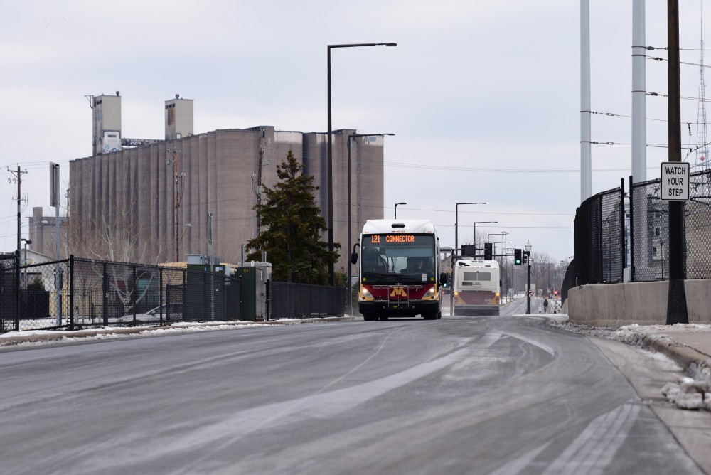 Campus connectors travel between Minneapolis and St. Paul campuses via the Universitys Transitway on Sunday, Dec. 10. The University is in talks with the Prospect Park Association to potentially relocate the Transitway to allow for further development of the neighborhood. 