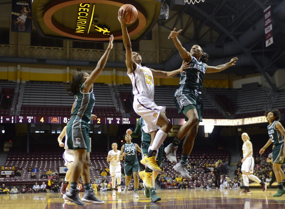 Redshirt junior guard Kenisha Bell scores for the Gophers on Sunday, Dec. 3 at Williams Arena. 