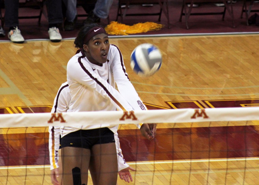 Opposite hitter Stephanie Samedy hits the ball against Wisconsin at the Maturi Pavilion on Saturday, Oct. 21.