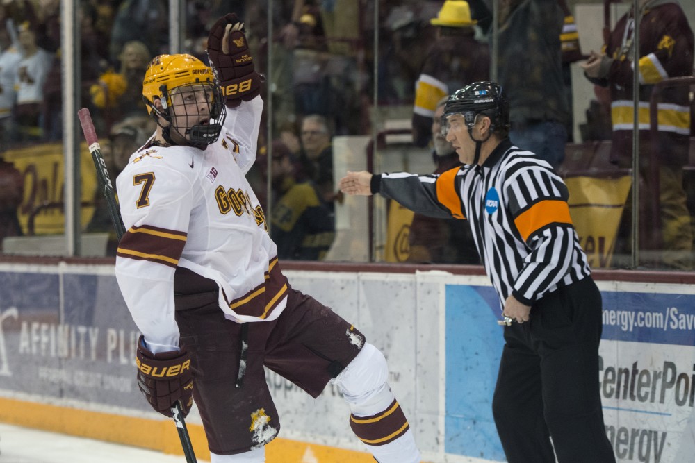Freshman forward Brannon McManus celebrates after scoring his goal late in the third period against Michigan on Friday.