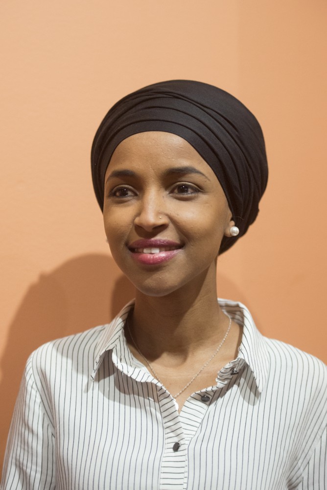 State Rep. Ilhan Omar poses for a portrait before speaking at her 2018 kickoff. 
