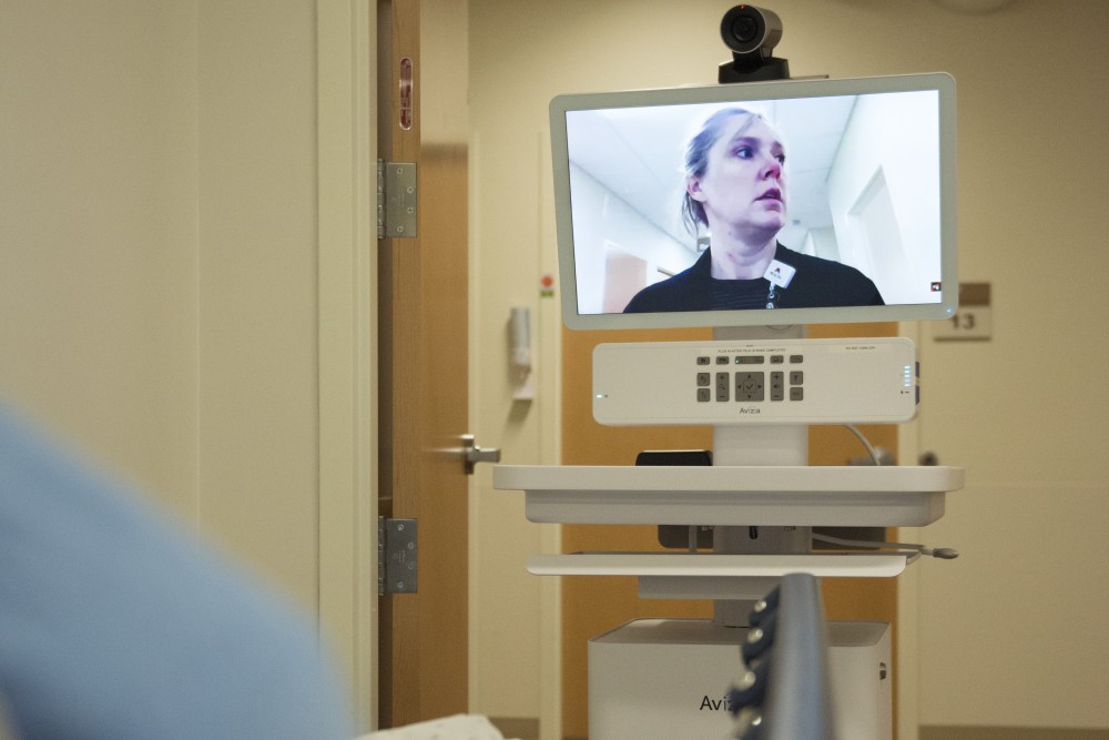Sarah Engager demonstrates how the Telestroke works at Fairview Southdale Hospital in Edina on Tuesday, Jan. 23. The machine helps doctors connect with patients face-to-face when they cannot be physically present in the room with them.