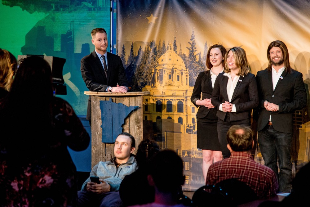 Jonathan Gershberg, host of Minnesota Tonight, delivers a monologue encouraging Michele Bachmann to run for Al Frankens recently-opened seat, during the shows season 3 premier, Wednesday Jan. 24. The group to his right insist that only God can decide if Bachmann runs for the seat.