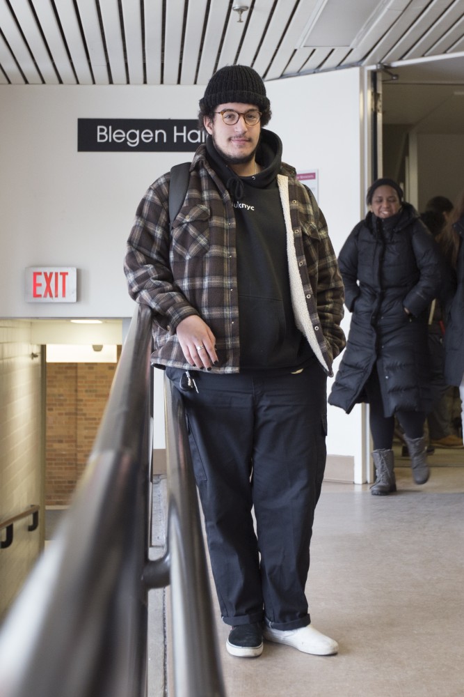 Sammy Yahiaoui poses for a portrait in Blegen Hall on Tuesday, Jan. 30.
