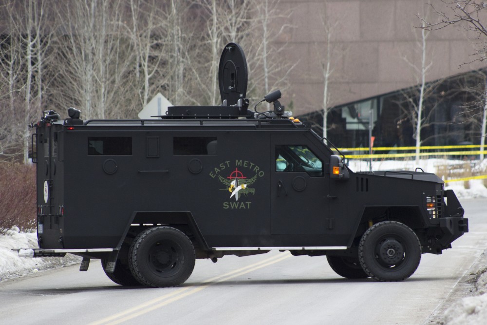 A SWAT vehicle is seen parked near the McNamara Alumni Center in response to the situation at the Graduate Hotel on Tuesday.
