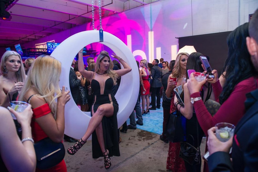 Attendees of the 2018 Maxim Party socialize on Saturday, Feb. 3, the night before Super Bowl LII. Tickets to the exclusive party started at $750 and featured special performances by Post Malone and DJ Marshmello.