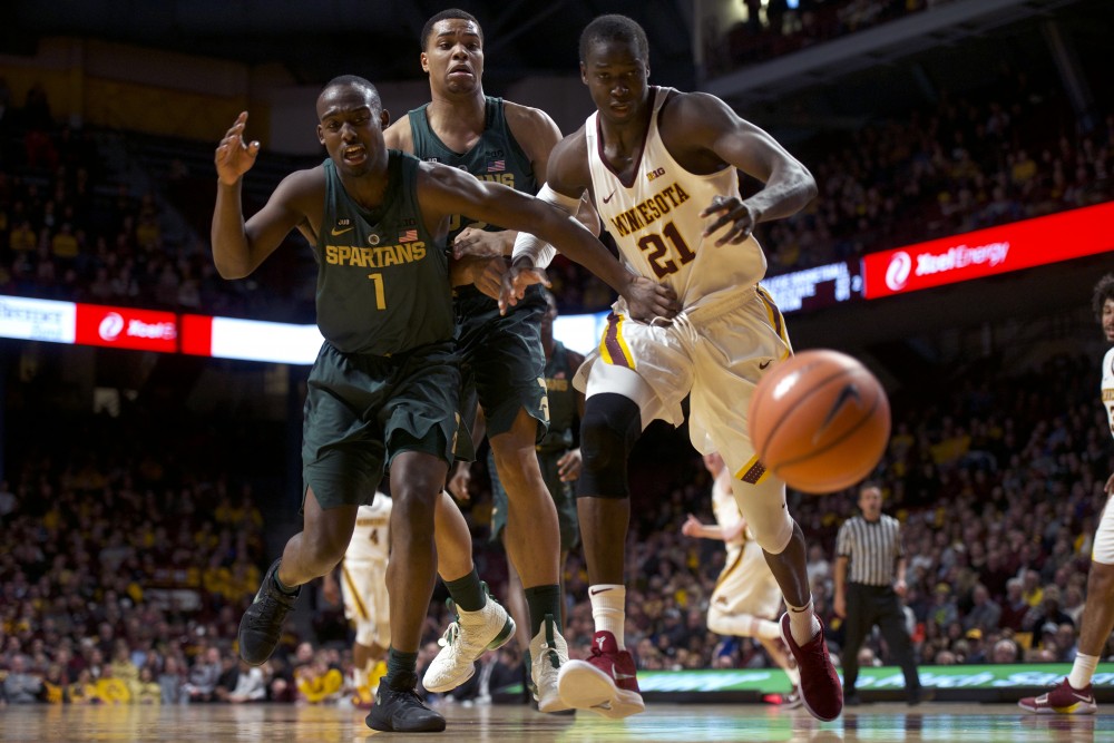 Senior center Bakary Konaté runs after the ball during a game against Michigan State at Williams Arena on Tuesday, Feb. 13.