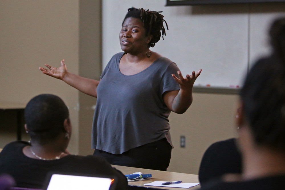 Irna Landrum presents a seminar on Wednesday, Feb. 14, at Jackson Hall as a part of the Black Student Unions new Wellness Wednesdays. The seminar covered institutionalized racism and how it contributes to peoples wellness using an arc from the television show The Walking Dead.