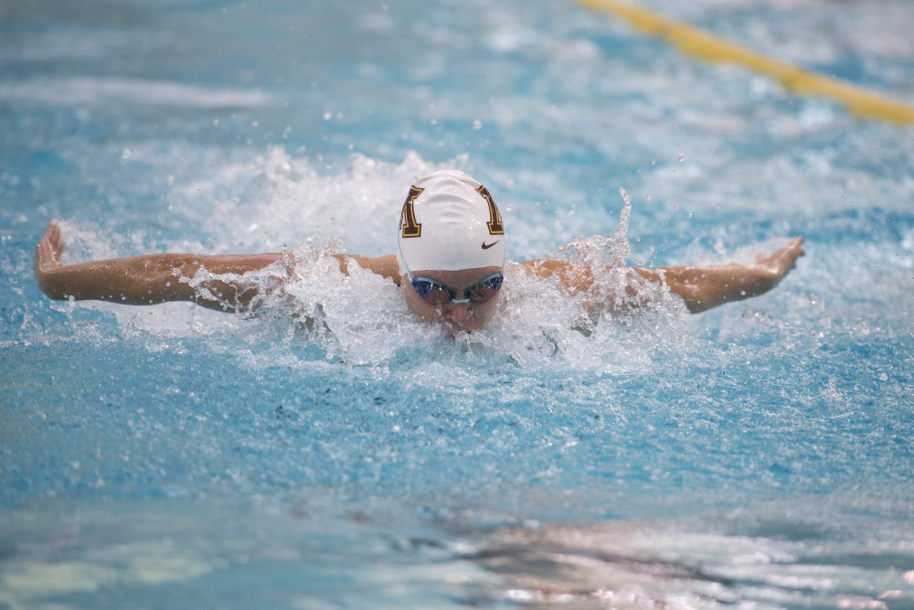 Senior Danielle Nack competes in the womens 100 yard butterfly at the Jean K. Freeman Aquatics Center on Saturday, Jan. 27. 
