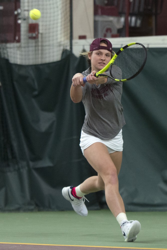 Junior Barbara Mancera returns the ball during her singles match against the University of South Dakota at the Baseline Tennis Center on Friday, Feb. 9. 