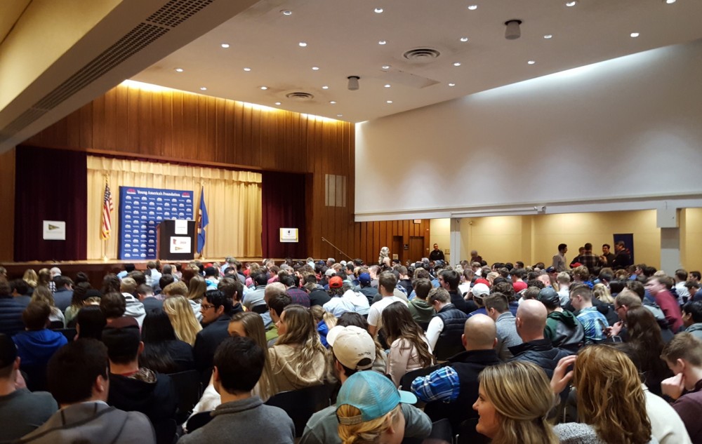 Attendees wait for conservative commentator Ben Shapiro to speak at the St. Paul Student Center on Monday, Feb. 26.
