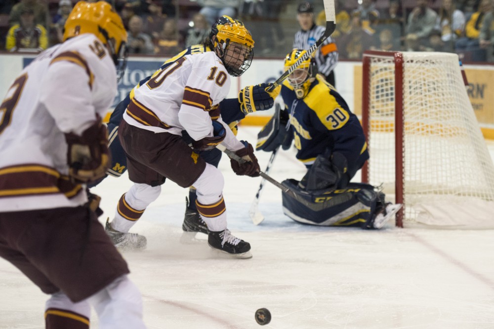 Forward Brent Gates Jr. looks for the puck during a game against Michigan at 3M at Mariucci Arena on Jan. 12, 2018.