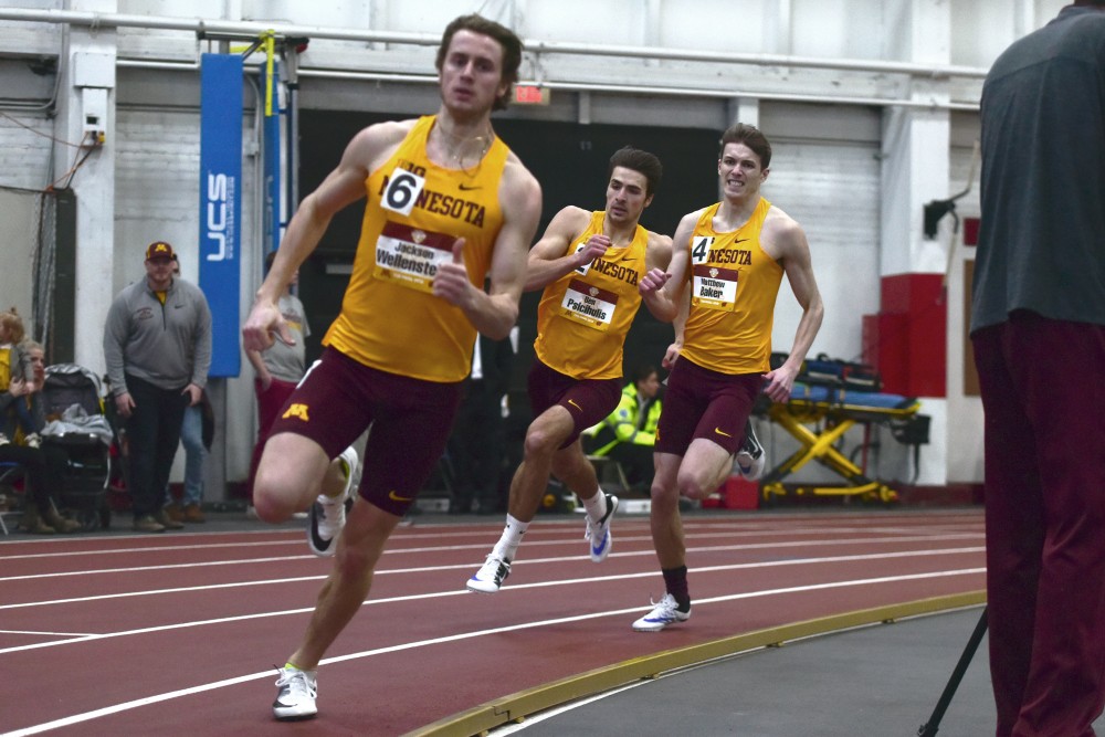 Gophers Jackson Wellenstein, Ben Psicihulis, and Matthew Baker compete in the 4x400-meter relay during the Border Battle on Jan. 13, 2018.