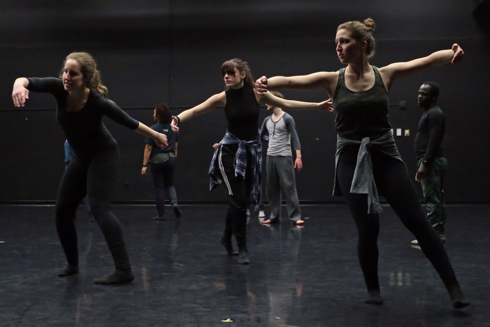 Katie Kummerow, right, learns a contemporary combination from her classmates during their modern 8 class on Thursday, Feb. 22 at Barbara Baker Dance Center on West Bank.