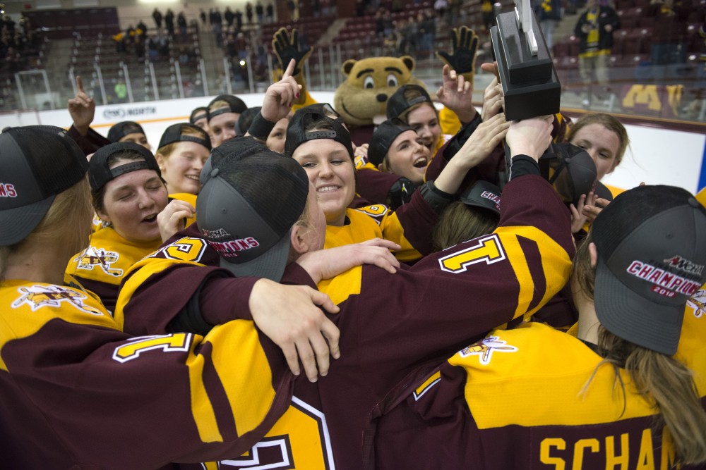 The Gophers celebrate their victory in the WCHA championship game against Wisconsin at Ridder Arena on Sunday, March 4.