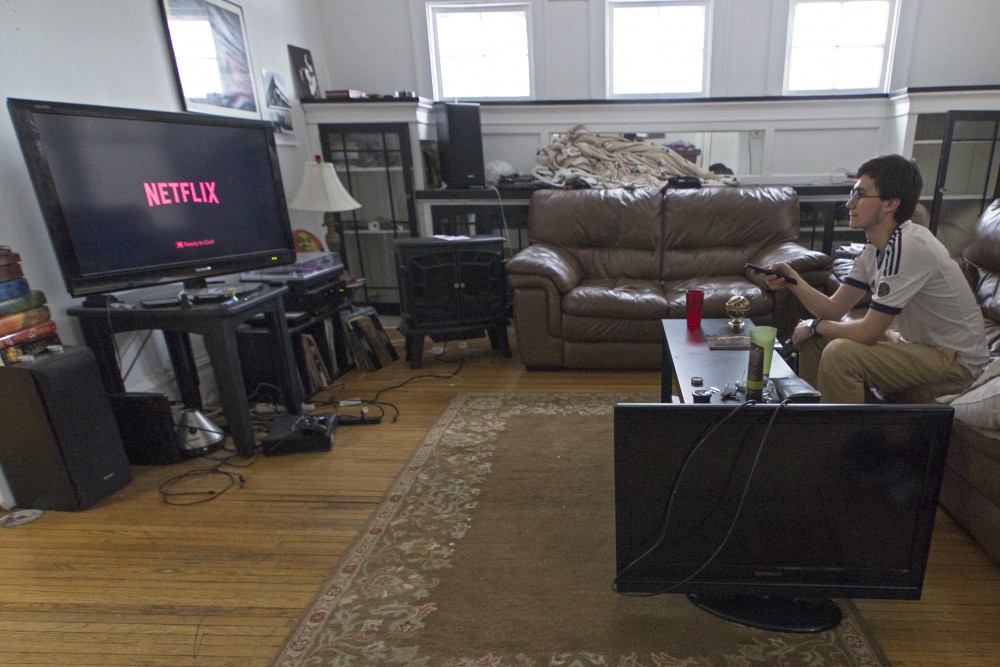 Isaac Cuellar sits down to watch Netflix in his home on Monday, March 5.