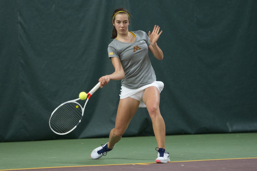 Sophomore Cammy Frei returns the ball during her singles match against the University of South Dakota at the Baseline Tennis Center on Friday, Feb. 9. 