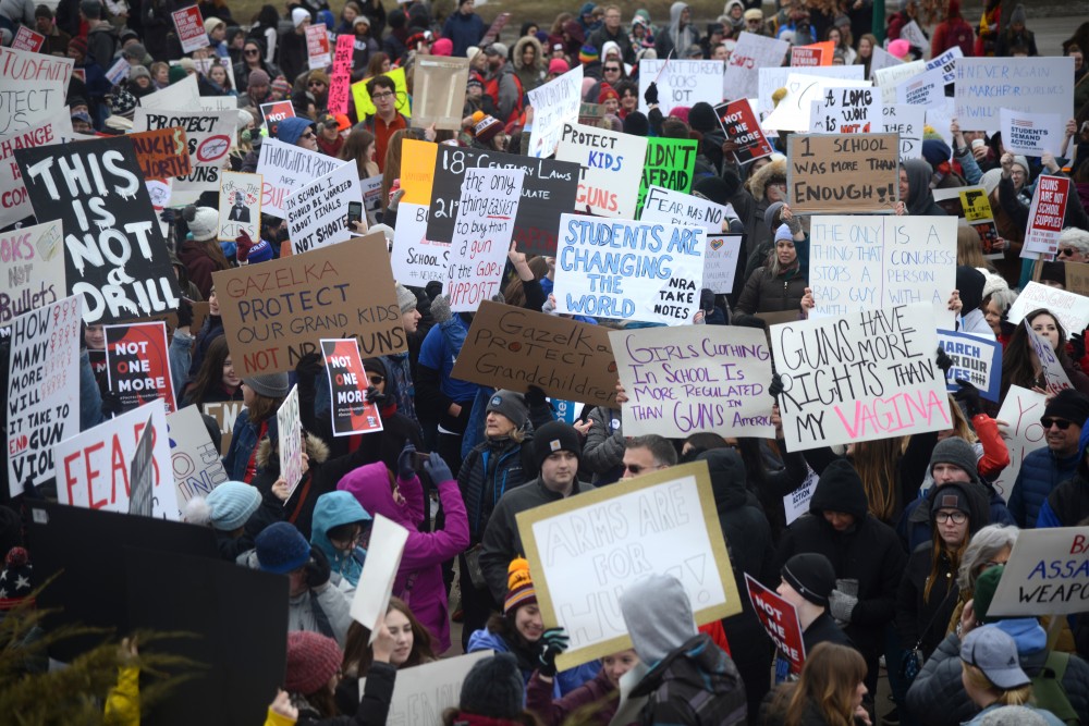 Gun control advocates hold a sea of signs at Harriet Island Regional Park for March for Our Lives Minnesota on Saturday, March 24. The march to the State Capitol drew thousands of participants including many children, teachers, and individuals personally impacted by gun violence.