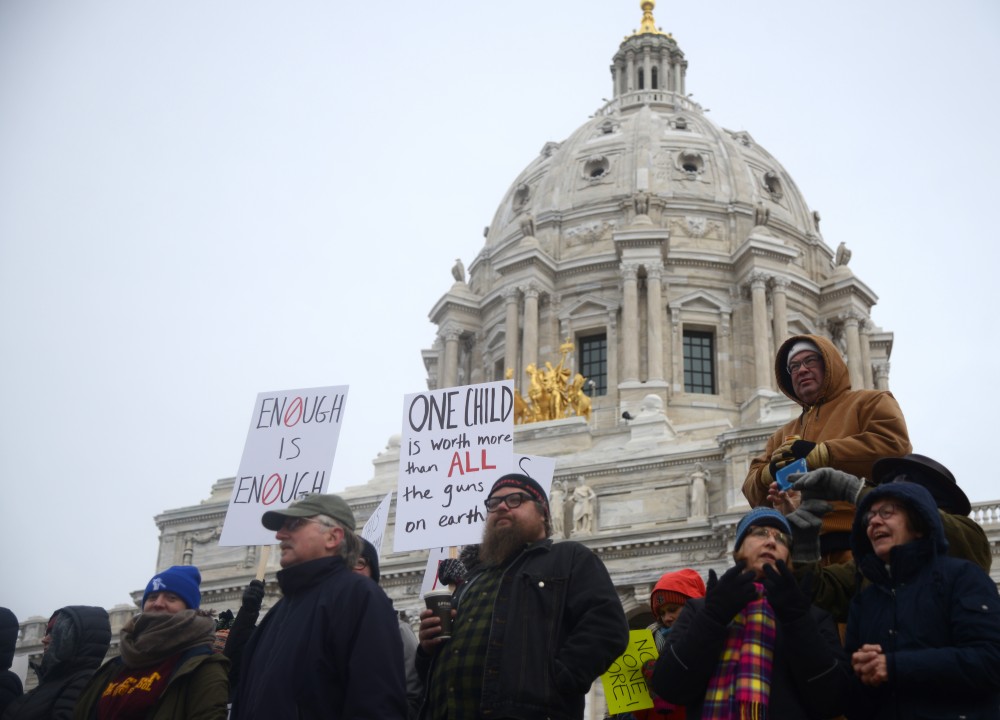 Gun control advocates gather in front of the State Capitol during March for Our Lives Minnesota on Saturday, March 24. Numerous speakers from the University of Minnesota, State and local political offices, and victims of gun violence delivered speeches to the crowd of thousands.