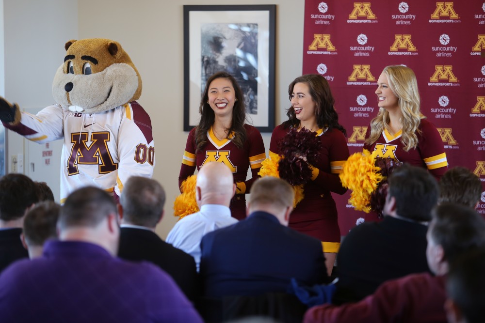 Goldy the Gopher and University of Minnesota spirit squad members entertain the crowd before new mens hockey coach Bob Motzkos press conference on Thursday, March 29, 2018.