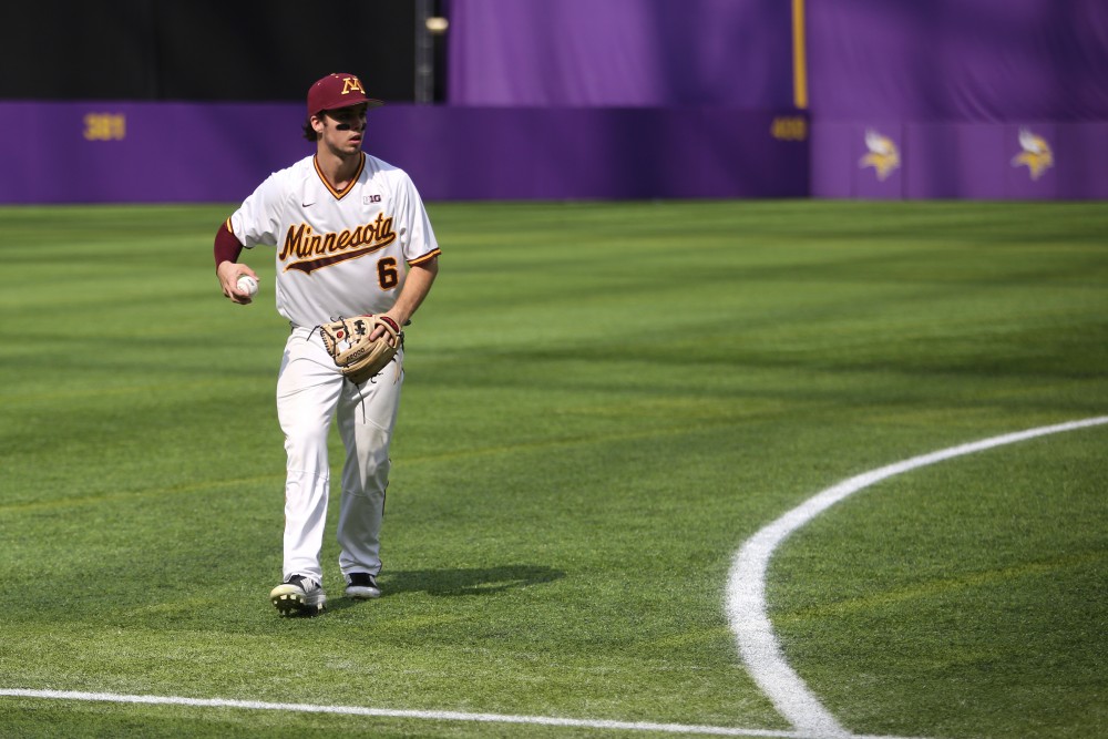 Junior Terrin Vavra returns the ball infield during the game against St. Johns University on Saturday, March 31 at U.S. Bank Stadium in Minneapolis. The Gophers won 6-3.