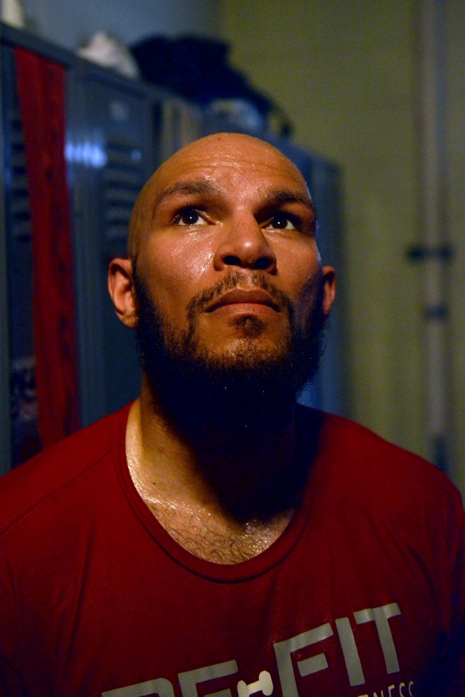 Minnesota super-middleweight professional boxer Caleb Truax poses in the locker for a portrait after a night of practice for his upcoming boxing match on Saturday, April 7.