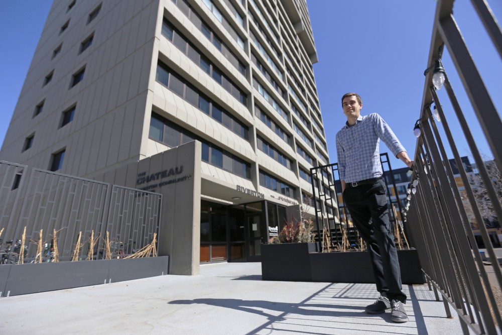 Riverton Community Housing Leasing Manager Joe Goetzke, who has worked for the co-op housing organization since 2011, poses for a portrait outside The Chateau on Tuesday, April 24 in Dinkytown. Riverton is opening a new co-op housing site in the former Bunge Tower grain elevator. 