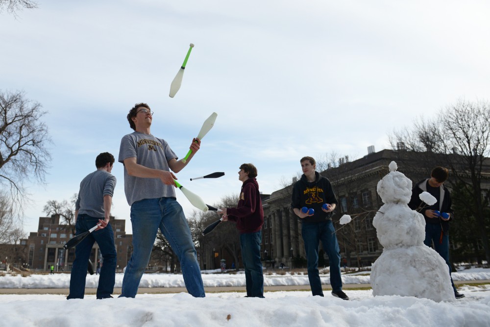 The Juggling Club meets outside Walter Library for practice. 