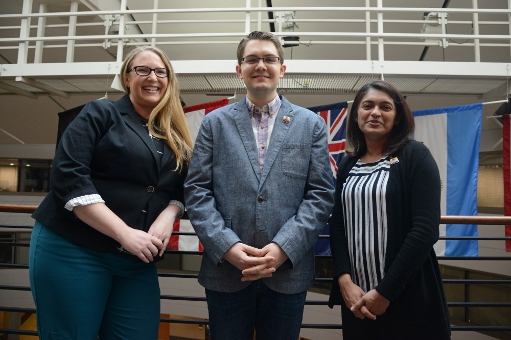 Elisha Friesema, Stephen Palmquist and Prachi Bawaskar pose for a portrait in Carlson School of Management on Tuesday, May 1.