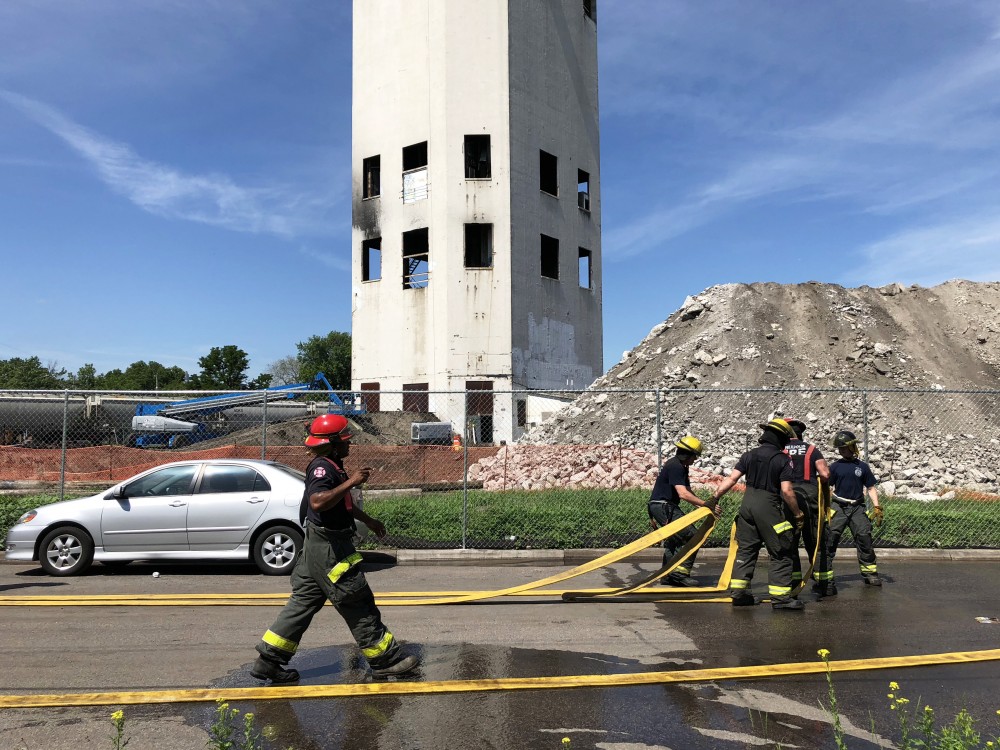 Firefighters put out flames at Bunge Tower on Friday, June 1, 2018 in the Southeast Como neighborhood. 