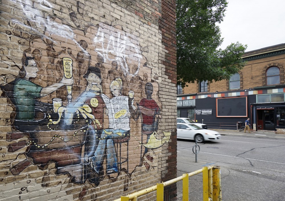 The Good Neighbor Fund, created in 2007 with money from the University, provides grants for various projects including one to preserve the murals in Dinkytown. Pictured is a mural on 4th Street SE on Monday, June 11. 