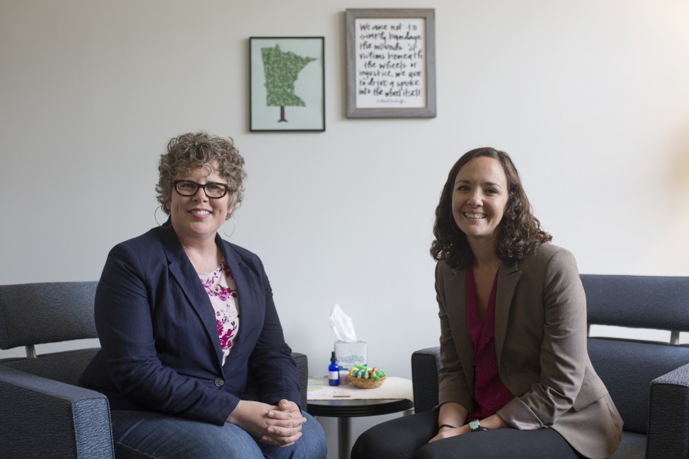 Senior care manager Emily OHara and care manager Sarah Gustafson-Dombeck pose for a portrait on Monday, June 11. The two are apart of an Office of Student Affairs care program that formed after care managers saw a 21 per cent demand for their services over the past year. 